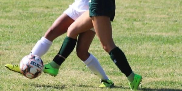 Soccer player competing in college match using ankle that recovered from surgery.  Physical therapy helped her to return to high level of play and get a scholarship.