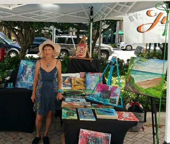 Photo of CharlotteDisplaying her work at an outdoor show