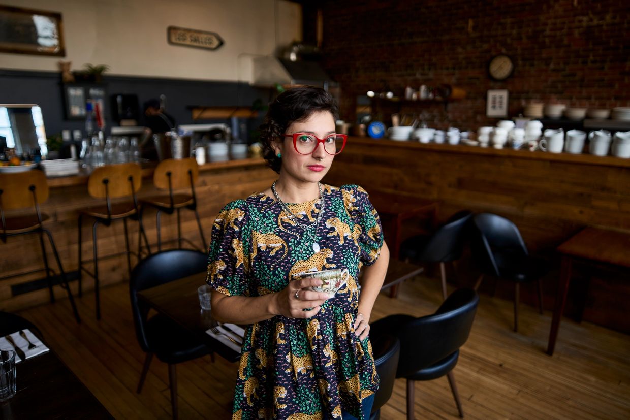 Nic Sánchez is mature, seen standing at Brumes du Coude restaurant in Moncton, NB, holding a teacup