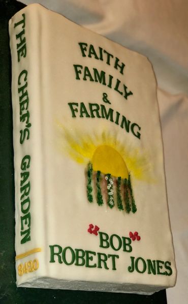 Robert "Bob" L Jones, Founder of The Chef's Garden, celebration of life book cake.