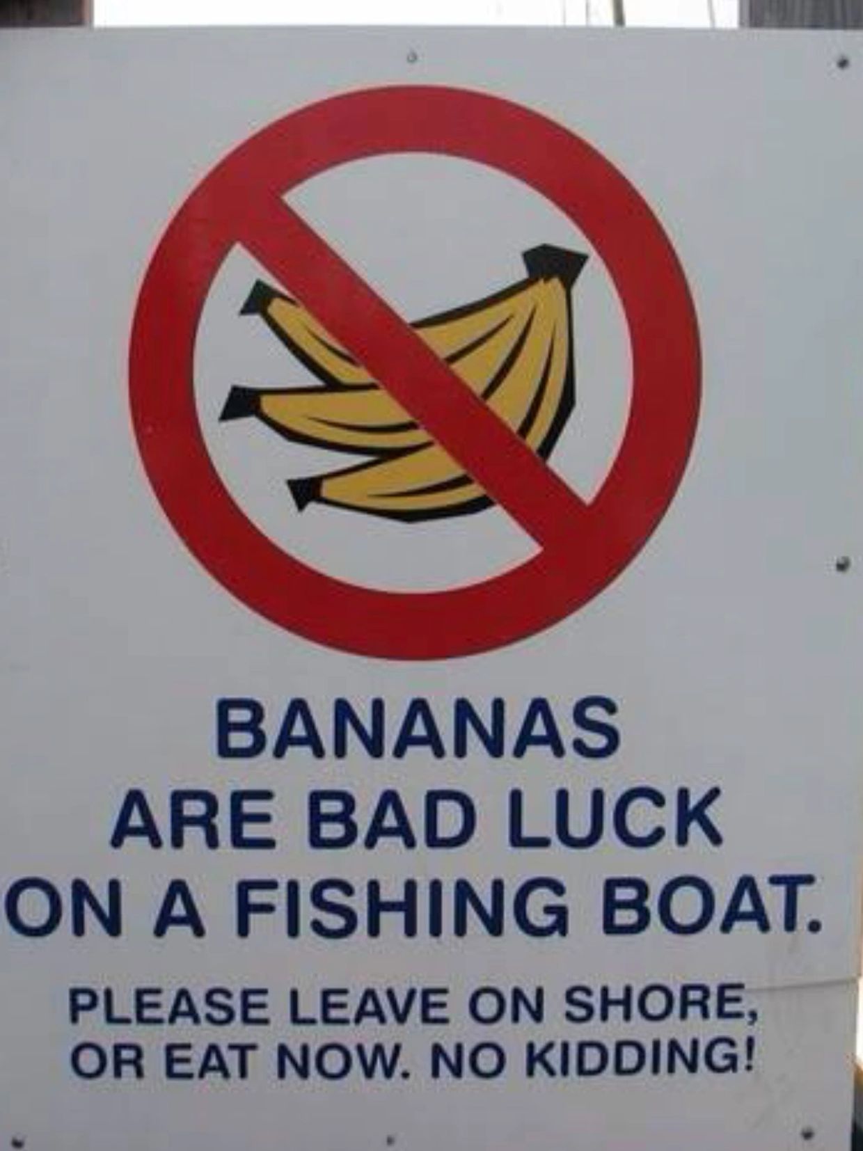 Sign warning that bananas are bad luck on fishing boats.
