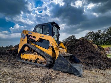 Skid loader farm manure moving
