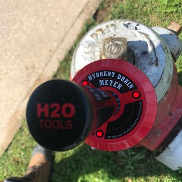 Hydrant Drain Meter, attached to hydrant with Magnet base.