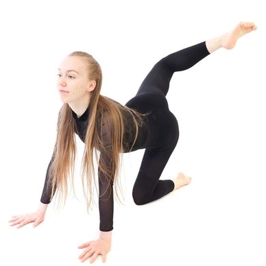 dancer doing an attitude back on the floor