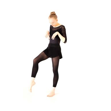 dancer with one foot lifted