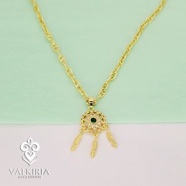 Gold necklace with a dreamcatcher pendant featuring a green center and three feather charms.