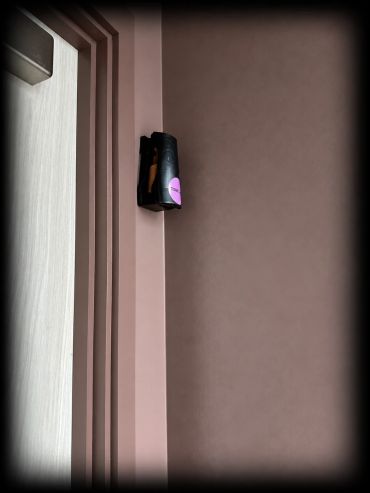 Wall-mounted dispenser containing Ethicork™ with a purple TOGETHER label in an accessible washroom