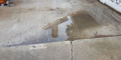 Do you have concrete that has sunken and pools water? We repair concrete before applying the Rubber Paving.