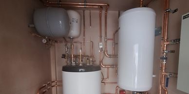 Renewable Heating — Heat Pumps & Low Carbon Systems Air source heat pump installation by Adapt Renewables in Chesterfield Derbyshire