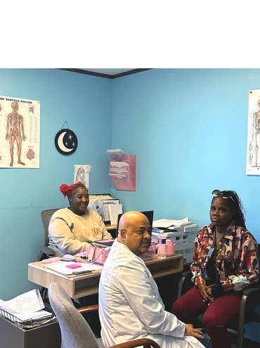 Dr. Aggarwal conducting a medical assesment at our Bellaire Clinic.