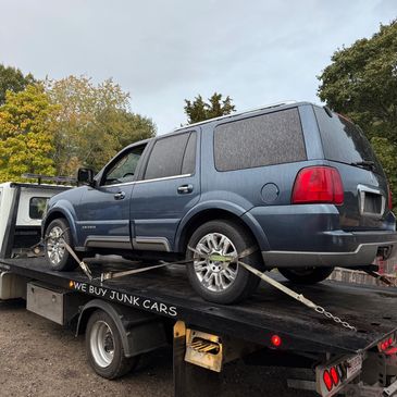 Junk Lincoln Navigator on truck