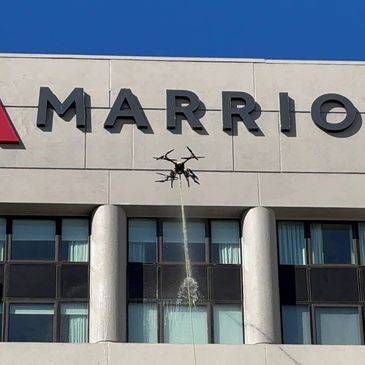 Marriott hotel is getting cleaned by the drone cleaning service by FlyWash Drone