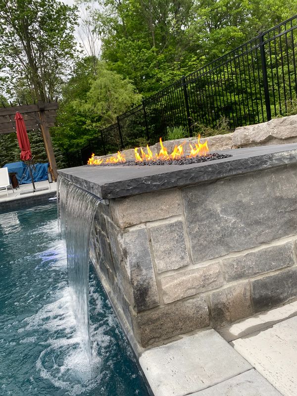 Fireplace, backyard fire feature, poolside fire feature, GTA Toronto Aurora Markham Ontario