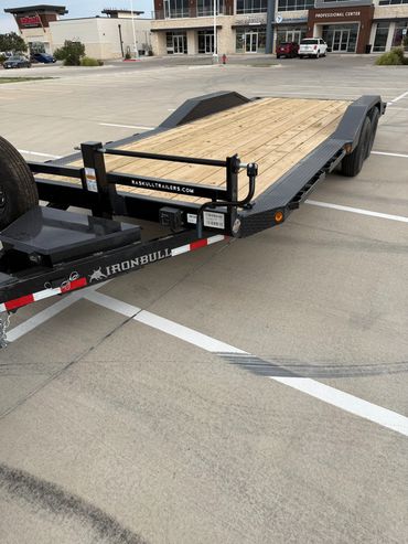22ft Iron Bull car hauler rental in Lubbock, TX with drive-over fenders & heavy-duty ramps, 14K GVWR