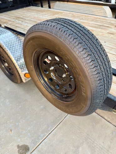 Utility trailer rental in Lubbock, TX – 4-inch channel frame, stake pockets, and strong deck