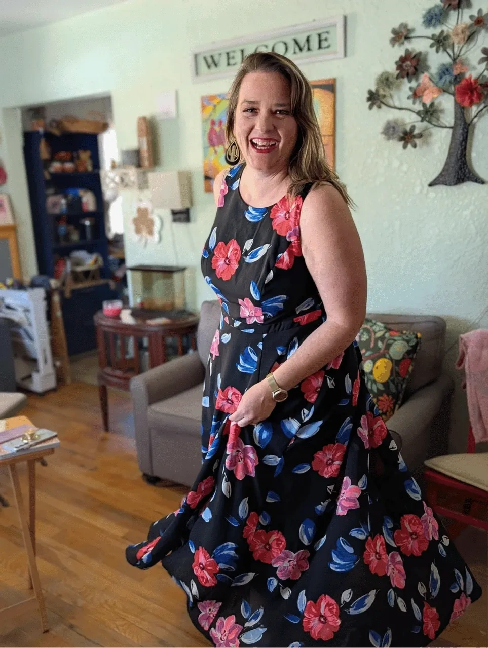 Virginia Hicks in a floral dress in her art studio