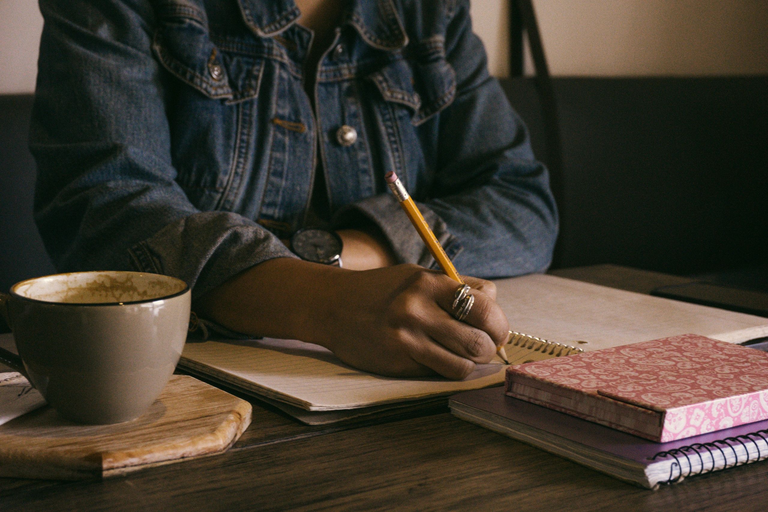 Woman writing African American