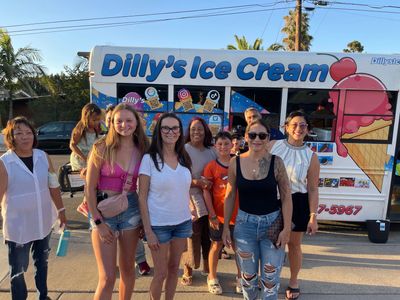 Group of people Enjoying the presence of Dilly's Ice Cream Truck Rental in San Diego