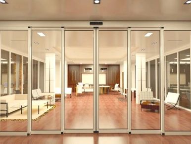 A telescopic automatic sliding door in a modern corporate building