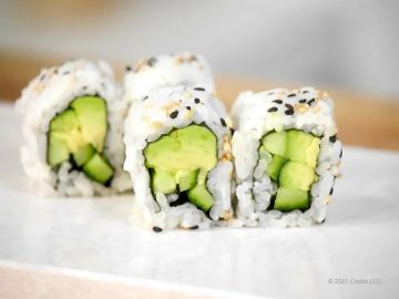 Close-up of avocado sushi rolls.