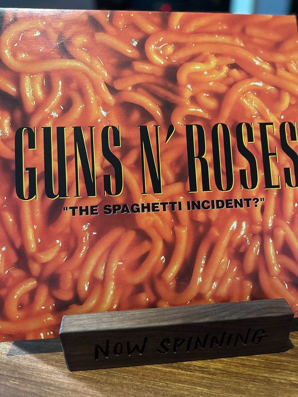 Vinyl album cover parody featuring spaghetti and Guns N' Roses text.
