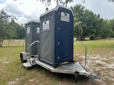 dual porta potty station with handwashing station
