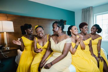 bride and bridesmaids wearing yellow