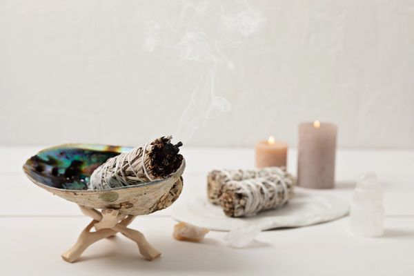 Smudge kit with white sage stick, abalone sea shell.