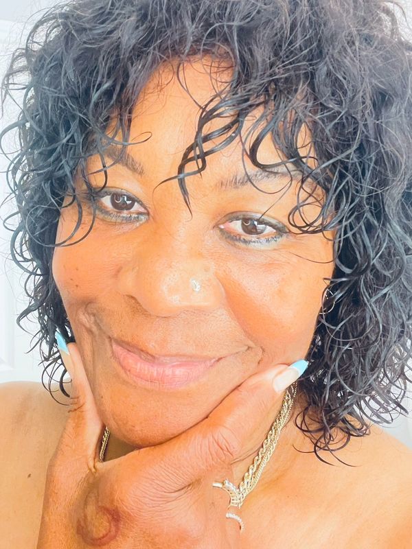 A woman with curly hair