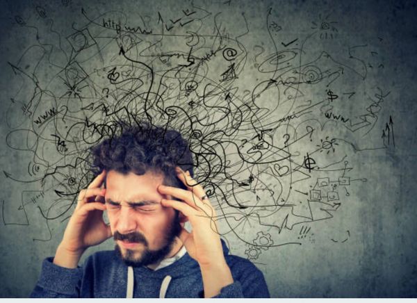 Man dealing with anxiety, overthinking and feeling on edge
