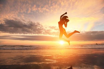 WOMAN CELEBRATING LIFE