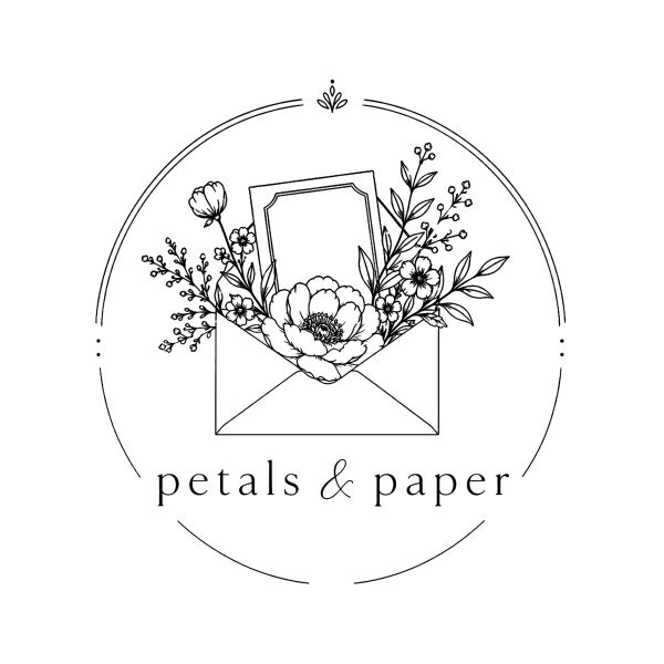 Elegant logo with envelope, flowers, and card for 'petals & paper'.