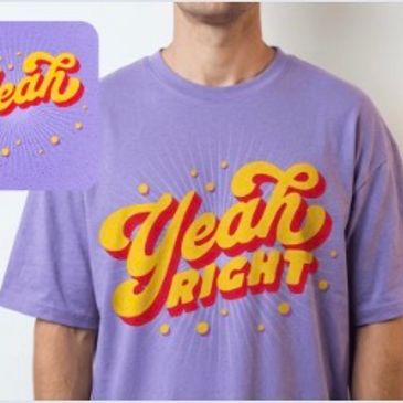 A person wearing a purple T-shirt with 'Yeah Right' in bold yellow and red letters.