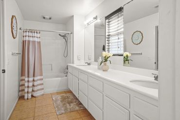 photo of a home's restroom with two sinks