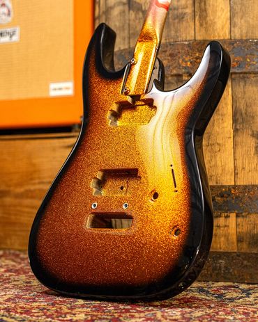 Heritage NOS Ember Burst Flake on a Soloist Style Body. Front.