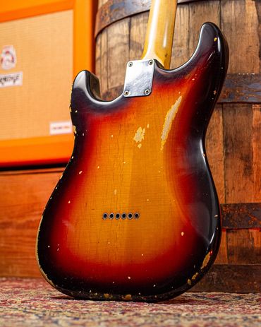 Relic'd '59 3-Tone Sunburst on a 1959 Stratocaster Body with Medium-Heavy Aging and Distressing.
