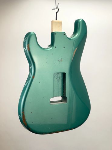 Relic'd Sherwood Green Stratocaster Body with Medium Aging and Distressing. Rear.