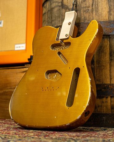 Relic'd Firemist Gold Telecaster Body with Medium Aging and Distressing. Front Shot.