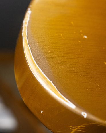 Relic'd Firemist Gold Telecaster Body with Medium Aging and Distressing. Close Up Shot.