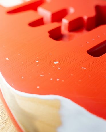 Relic'd Fiesta Red Strat Body with Heavy Aging & Distressing. Close Up.