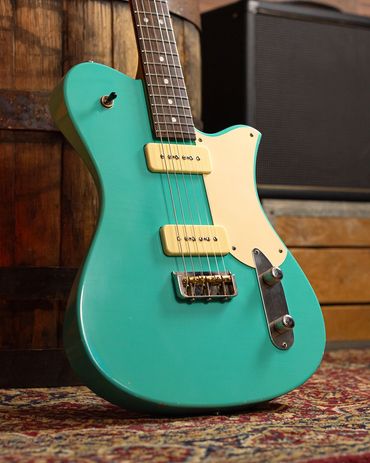 Relic'd Seafoam Green Tomcat Body with Light Aging and Distressing. Front.