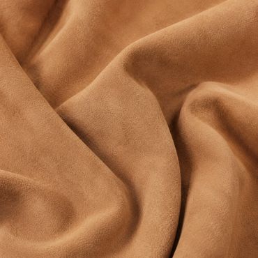 Warm Kalahari Sand nubuck leather with a fine velvety nap and relaxed folds.