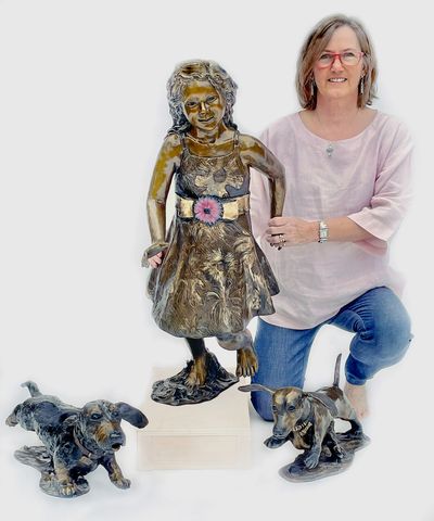 Pamela Winters with her bronze sculpture creation
