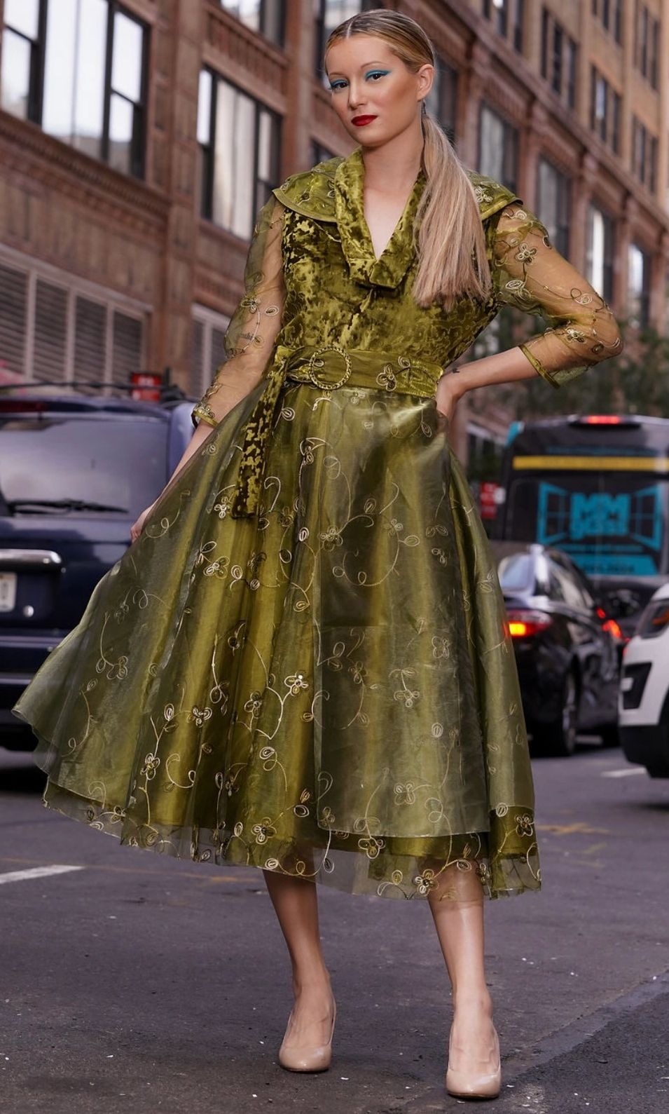Olive green silk tiered evening dress: crush velvet bodice, embroidered organza, Swarovski buckle.