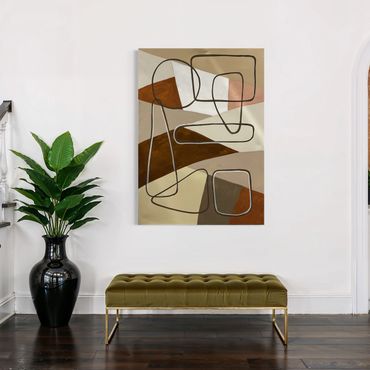 Modern abstract painting above olive bench and black vase with green plant.