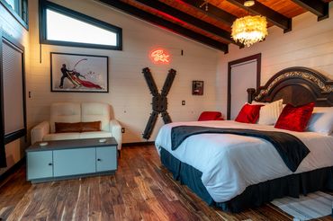 Luxurious king-sized bed with sexy images and furniture.