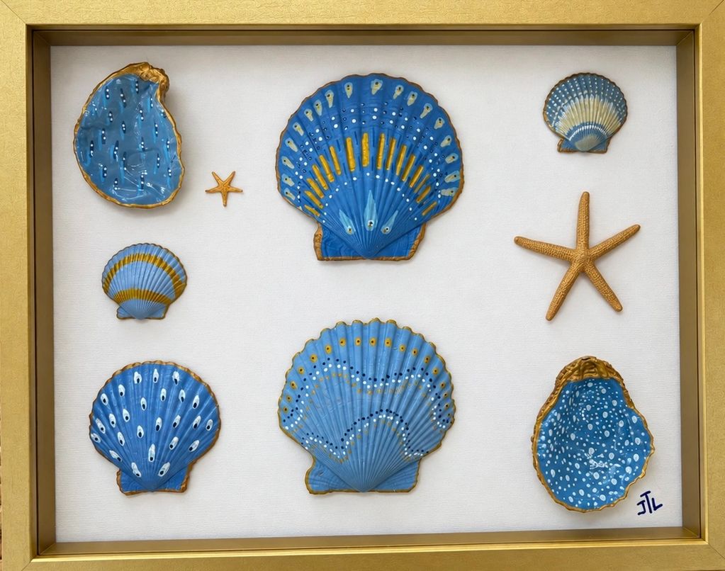 Framed collection of hand-painted blue seashells and gold starfish