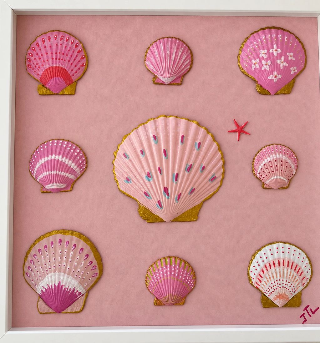 Collection of hand-painted sea shells in pink, white and coral with coral star fish