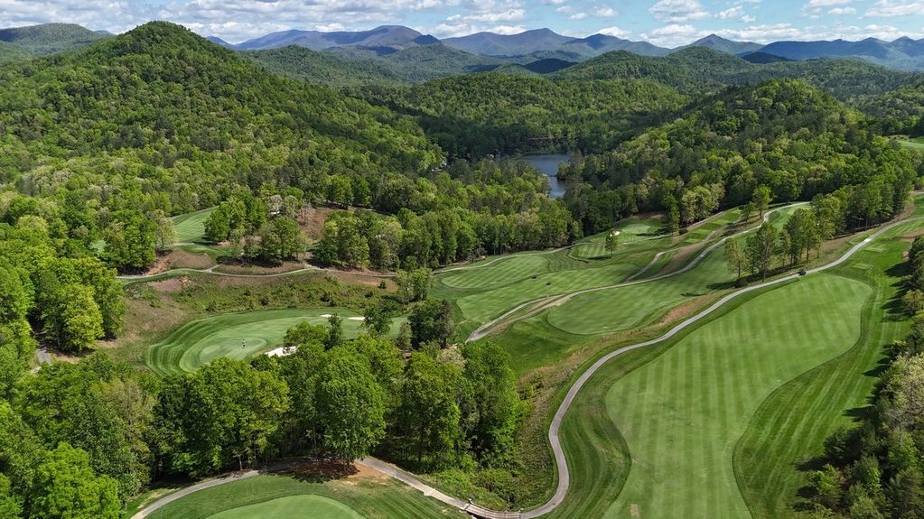 Crystal-clear waterfall at Lake Burton mountain landscape