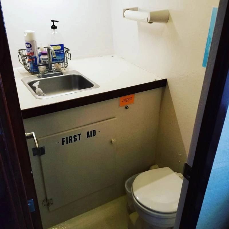 The bathroom in the deep sea fishing boat Hard Charger in Destin, FL.
